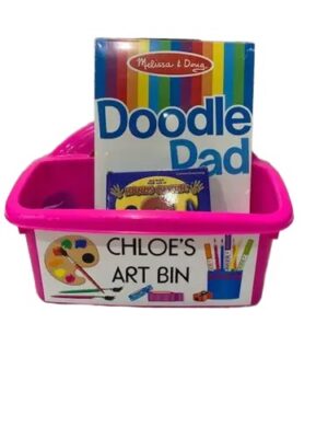 Pink art bin holding Doodle Pad