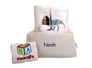 Personalized baby gift basket with embroidered cloths