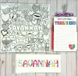 Savannah-themed coloring poster with notepad