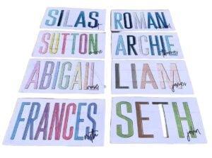 Colorful children's name cards on white background