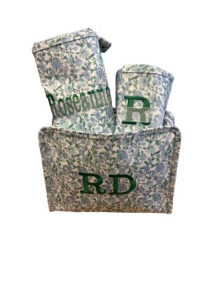 Monogrammed green floral fabric storage baskets