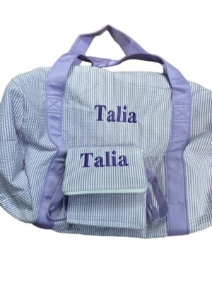 Light blue duffel bag embroidered "Talia
