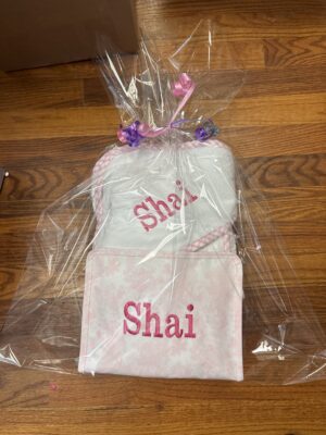 Pink personalized embroidered towel and blanket