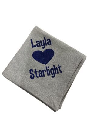 Gray folded sweatshirt printed "Layla heart Starlight