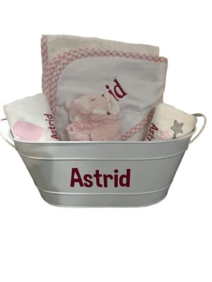 Personalized pink baby gift basket labeled Astrid