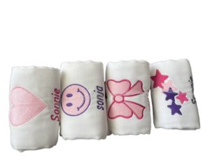 Embroidered baby cloths with heart, bow, stars