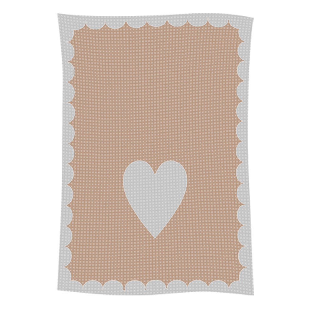 Peach blanket with white heart and scalloped border