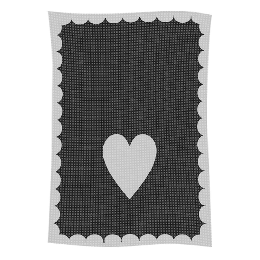 Scalloped edge crochet mat with white heart
