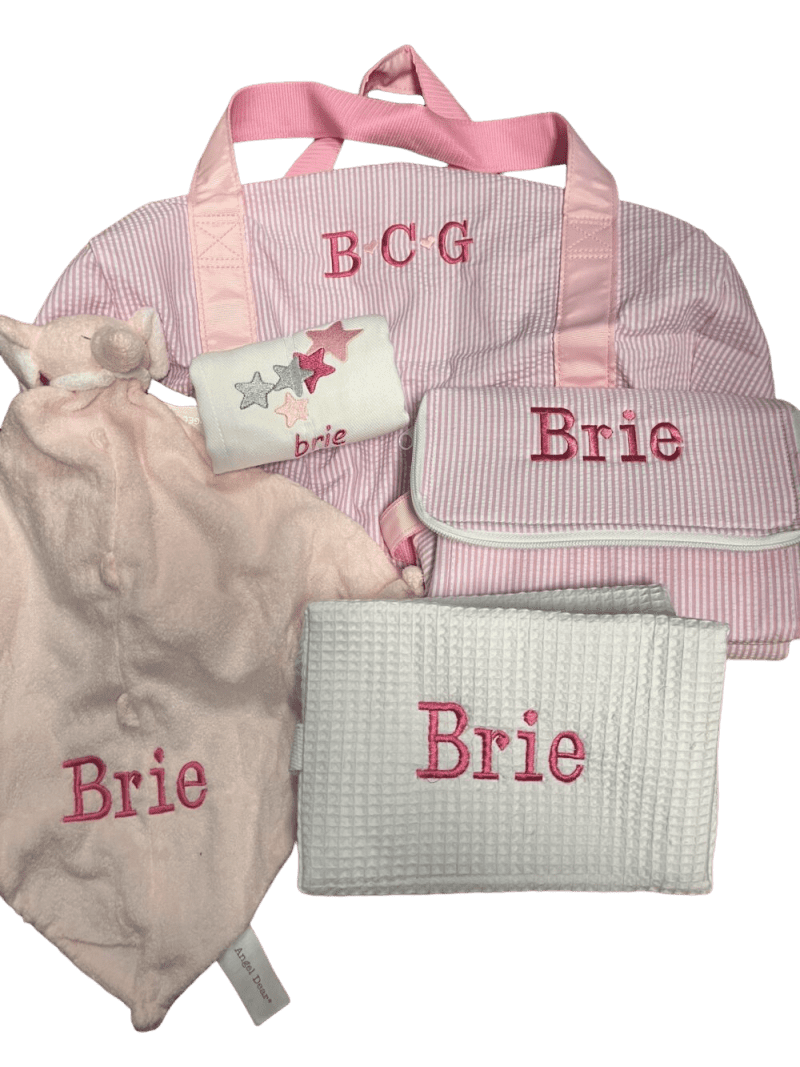 Pink personalized baby bag and accessories