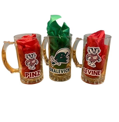 Three glass mugs with colored tissue paper